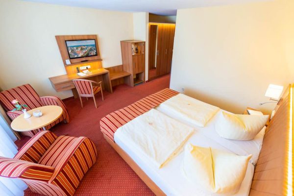 Zimmer im Ostseebad Binz auf der Insel Rügen – Schlafzimmer vom Apartment im Centralhotel