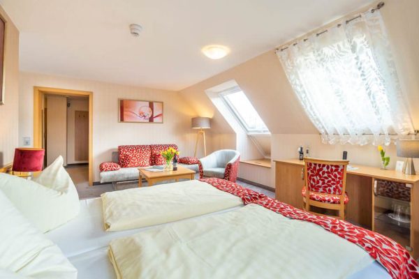 Schlafzimmer der Luxus-Apartment-Suite im Centralhotel Binz auf Rügen